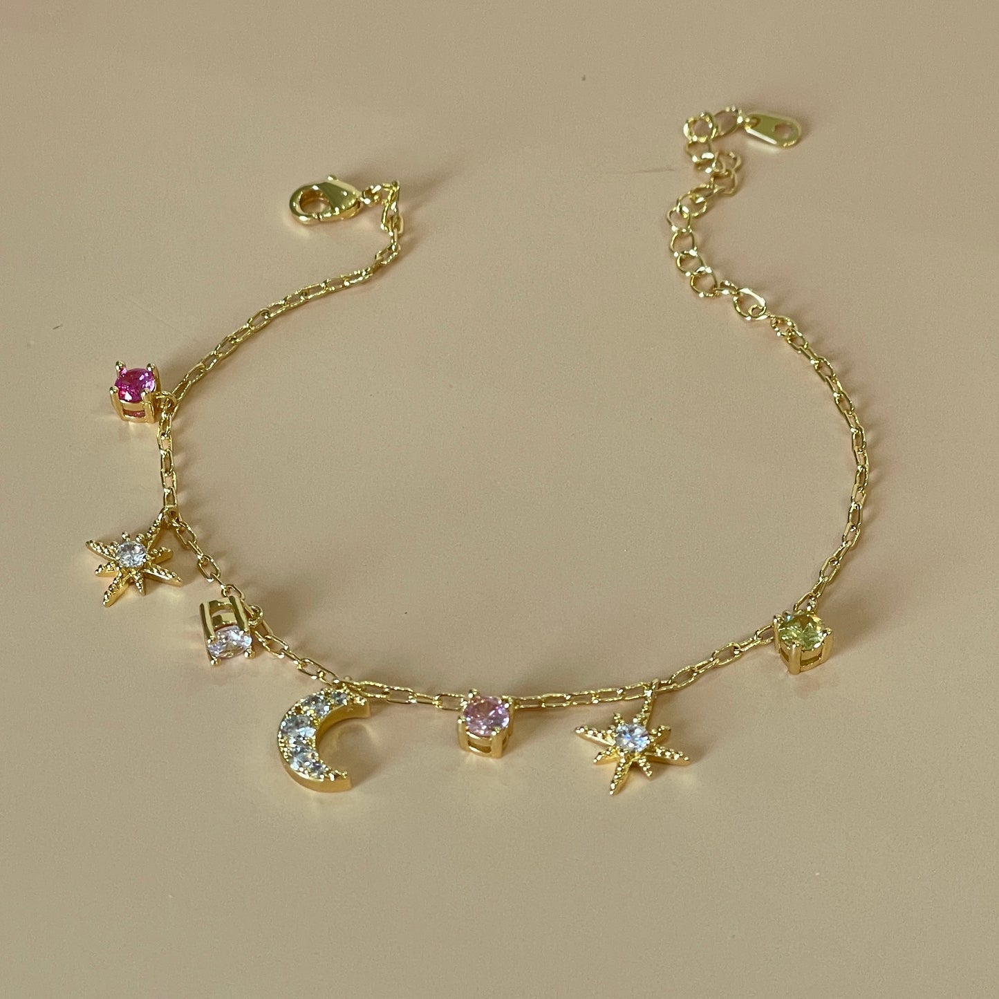 PULSERA ESTRELLA Y LUNA CRISTAL ROSA