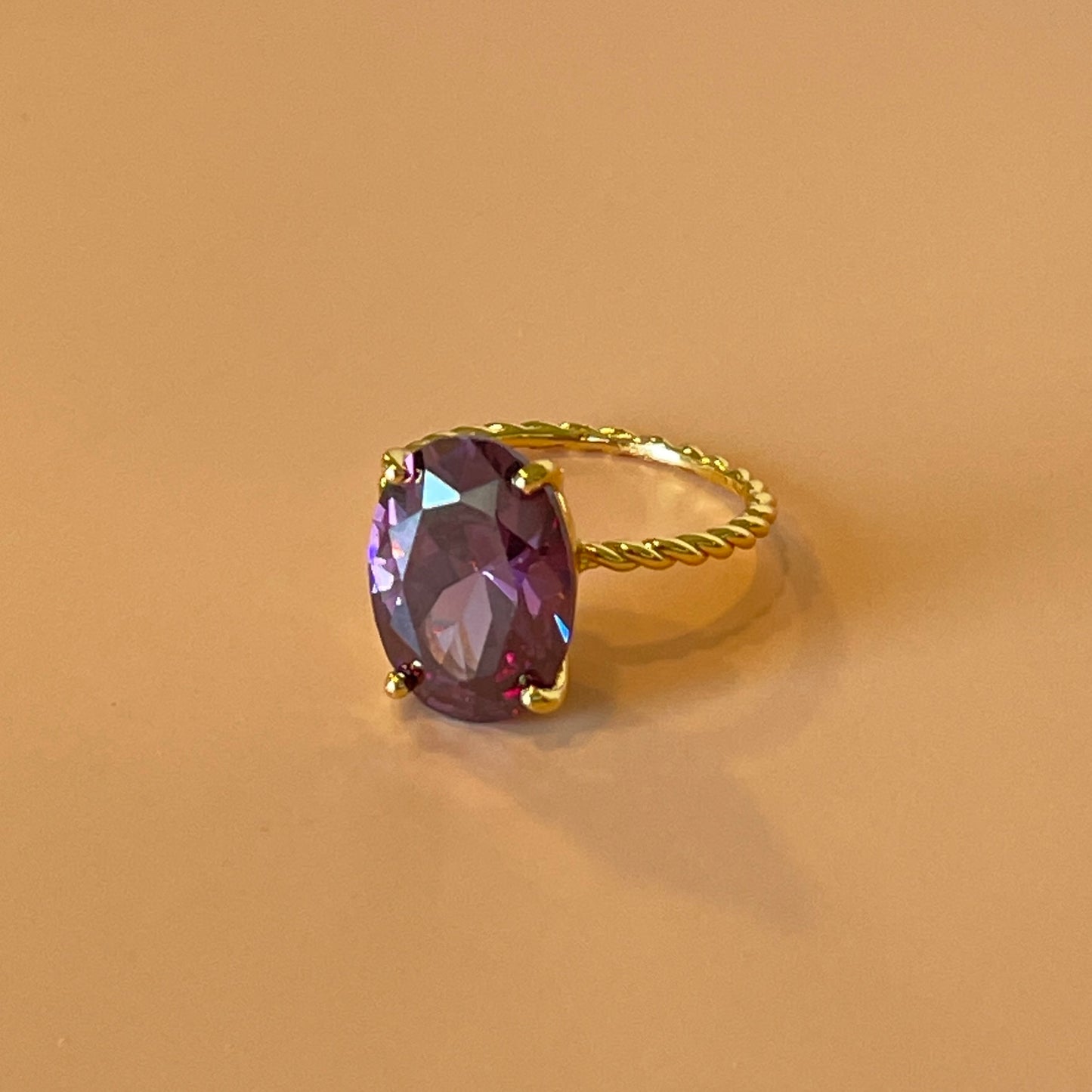 ANILLO MORADO CRISTAL OVALADO