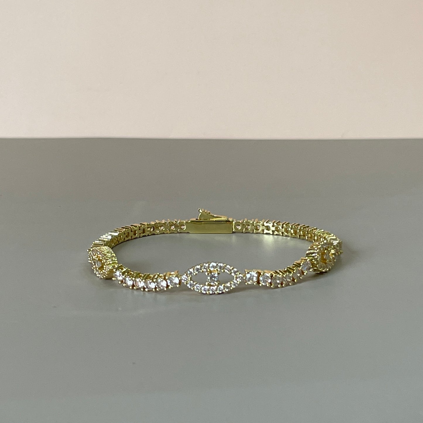 PULSERA TENNIS CON TRES OJITOS