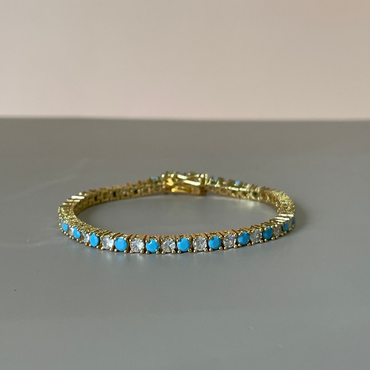 PULSERA TENNIS TURQUESA Y CLEAR