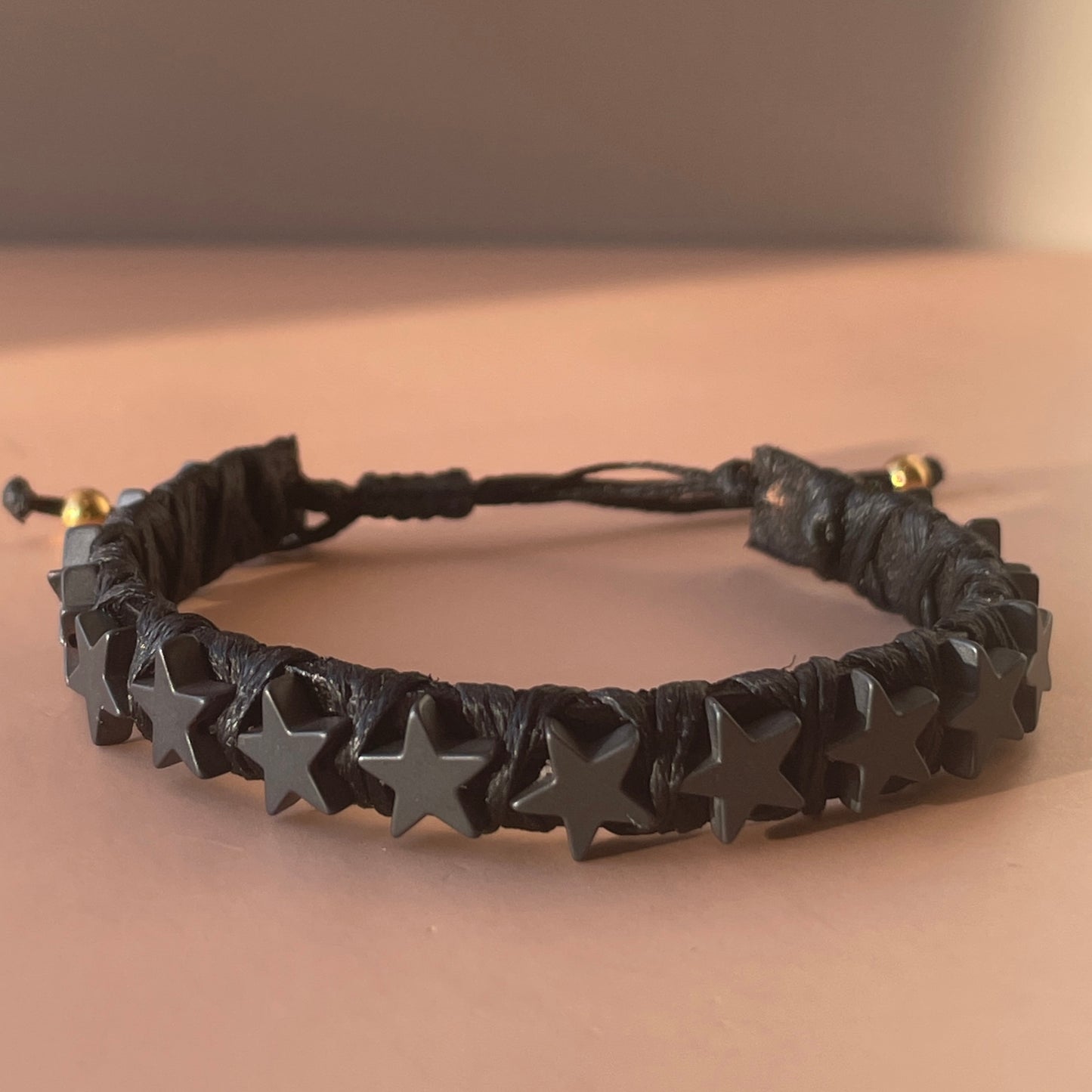 PULSERA FAVORITA ESTRELLA NEGRA MATE -HN