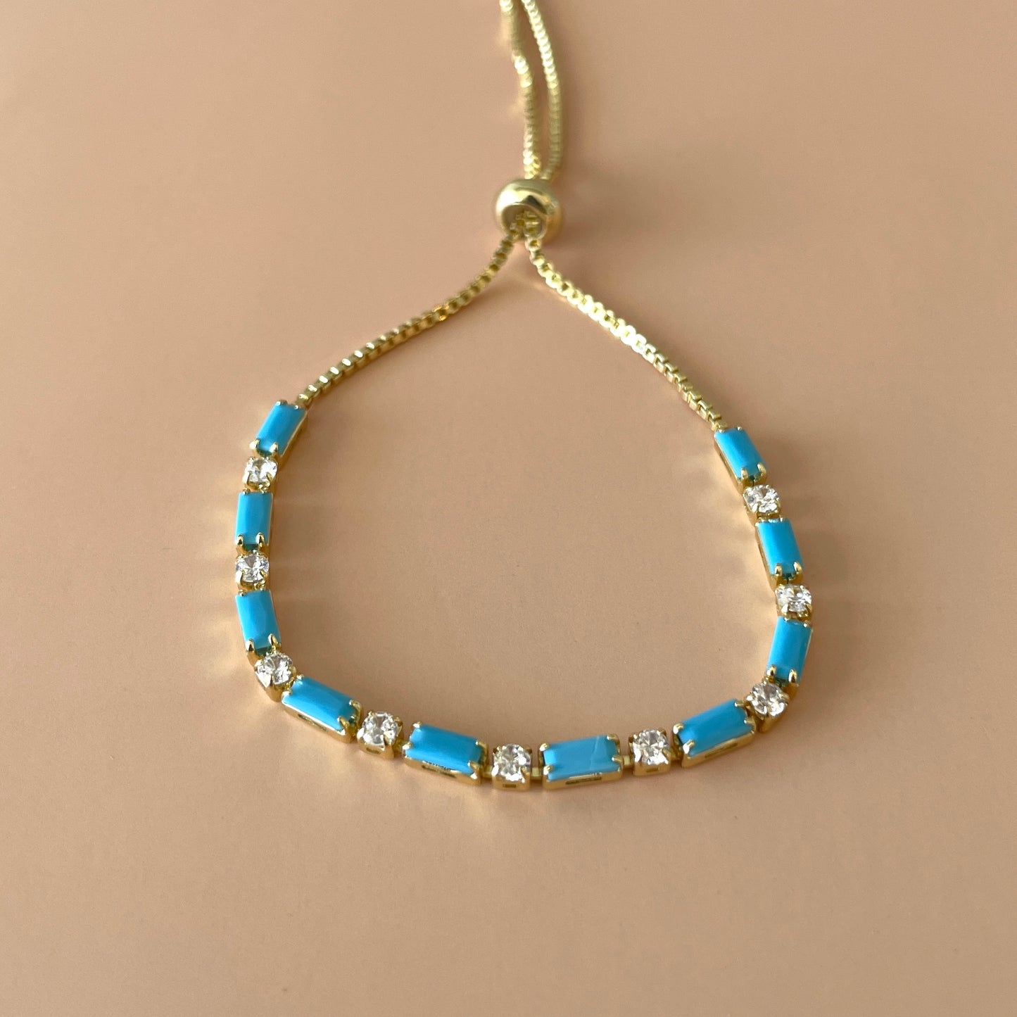 PULSERA BAGUETTE AJUSTABLE TURQUESA -CLEAR