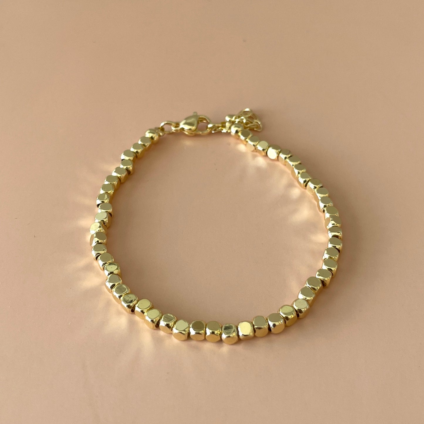 PULSERA GOLD MINI CUBOS