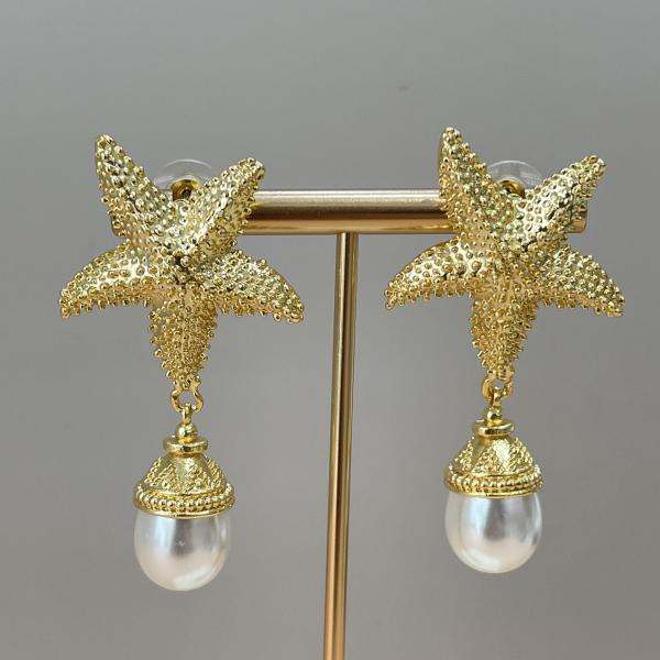 ARETES SOL ESTRELLA CON PERLA