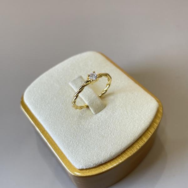 ANILLO TORCIDO CON PUNTO CLEAR