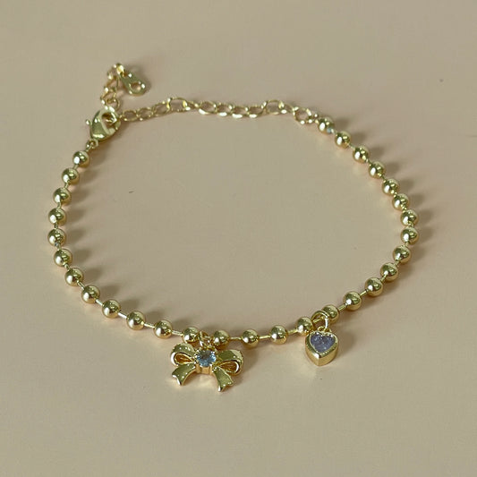 PULSERA DE BOLITAS MOÑO
