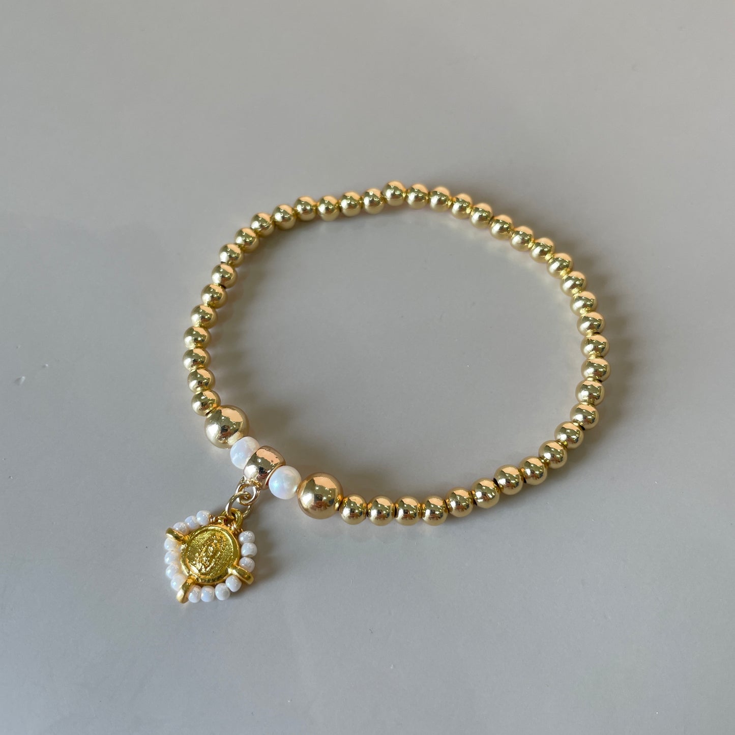 PULSERA BOLITAS CON VIRGEN DE GUADALUPE