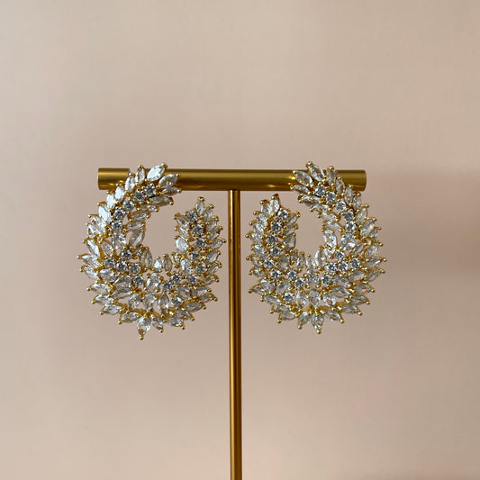 ARETES TIPO MEDIA LUNA CON CIRCONIAS