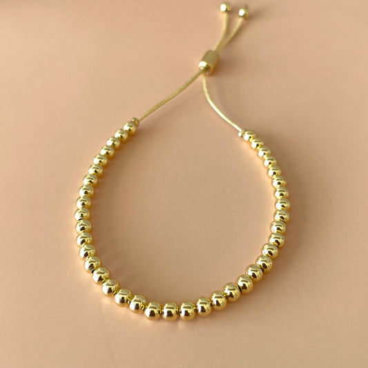 PULSERA AJUSTABLE BOLITAS GOLD