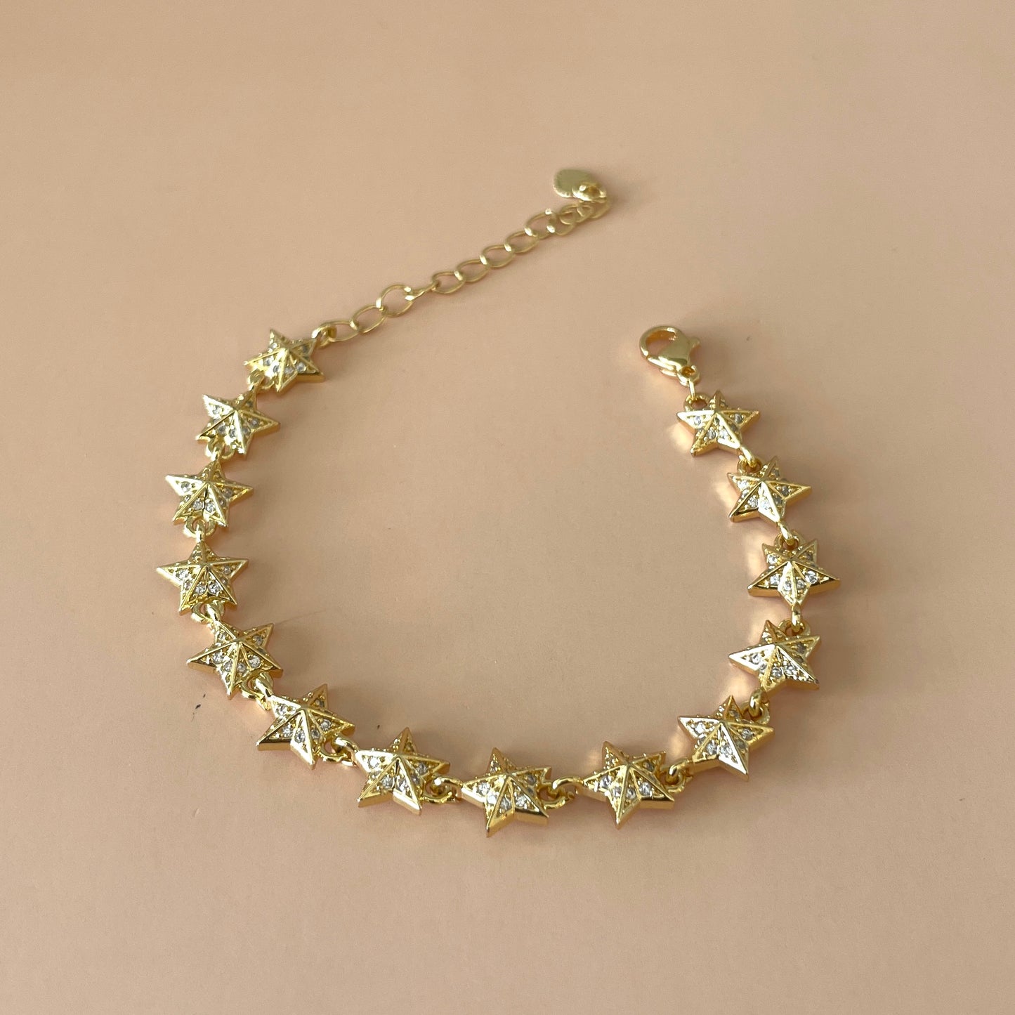PULSERA ESTRELLAS GOLD & CLEAR