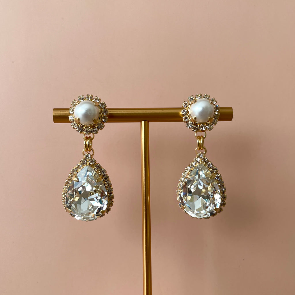 ARETES HEAVEN FAVORITOS CLEAR Y PERLA -CLEAR