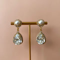 ARETES HEAVEN FAVORITOS CLEAR Y PERLA -CLEAR