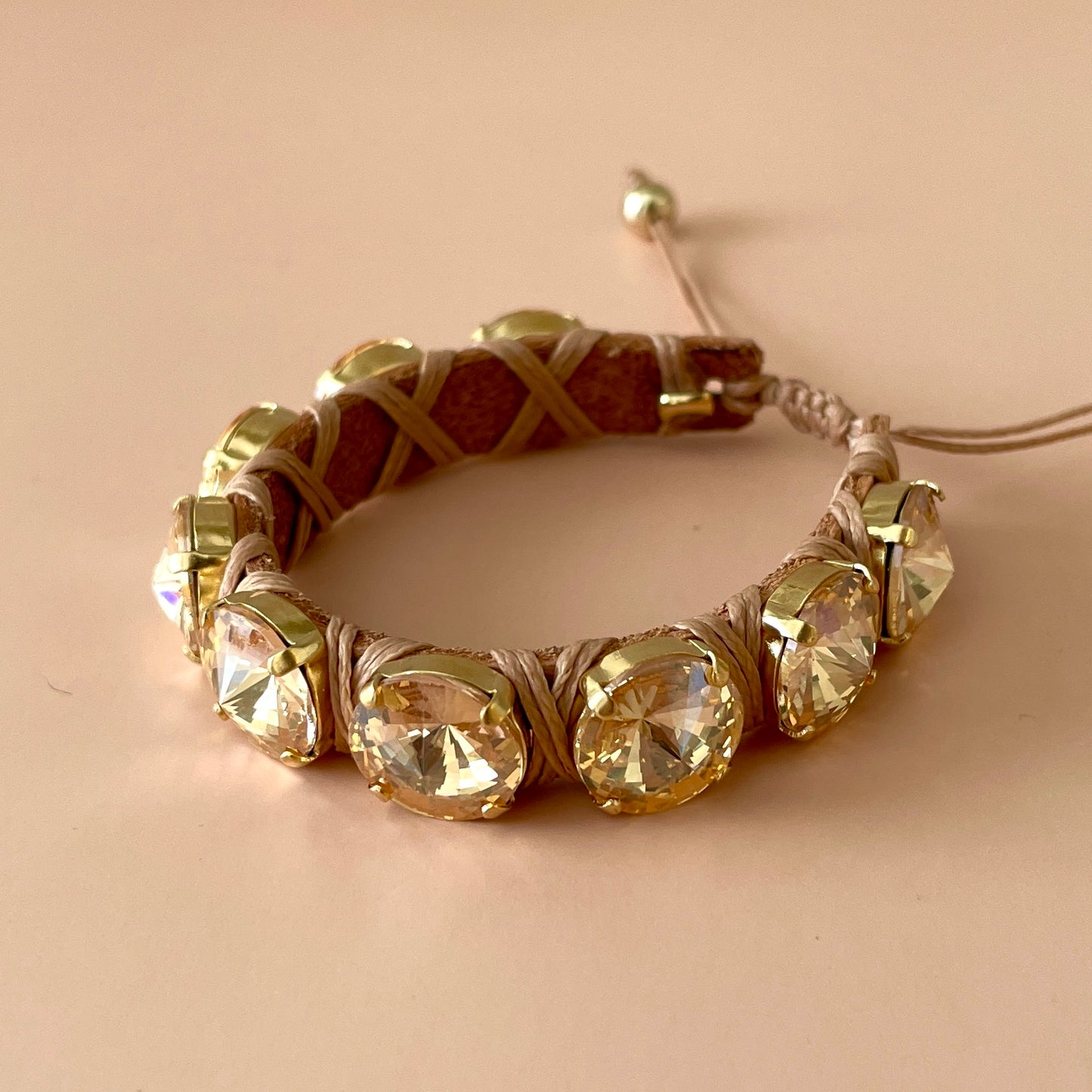PULSERA CLEO CRISTAL DORADO  -HB