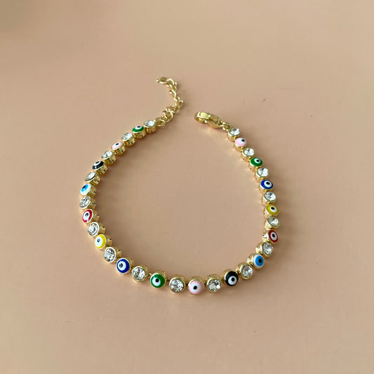 PULSERA TENNIS GOLD OJO COLORFULL