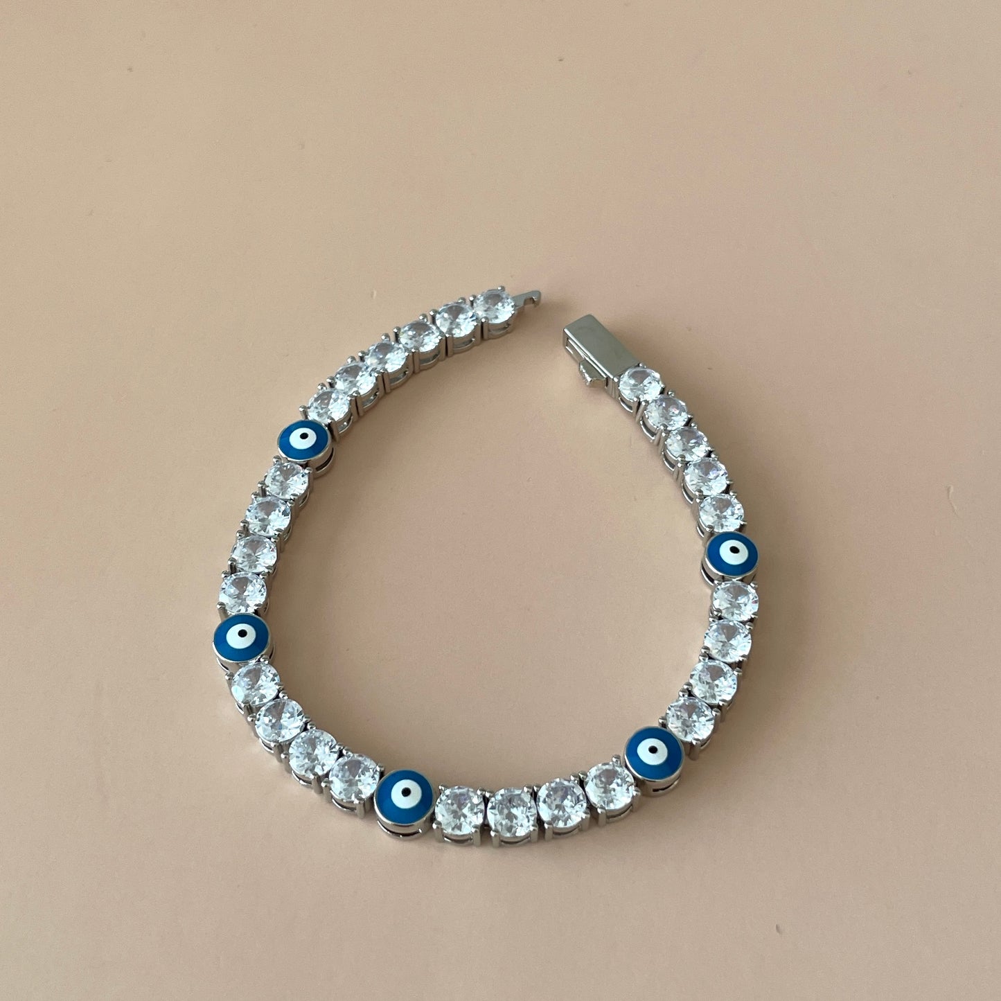 PULSERA TENNIS CON OJO AZUL SILVER