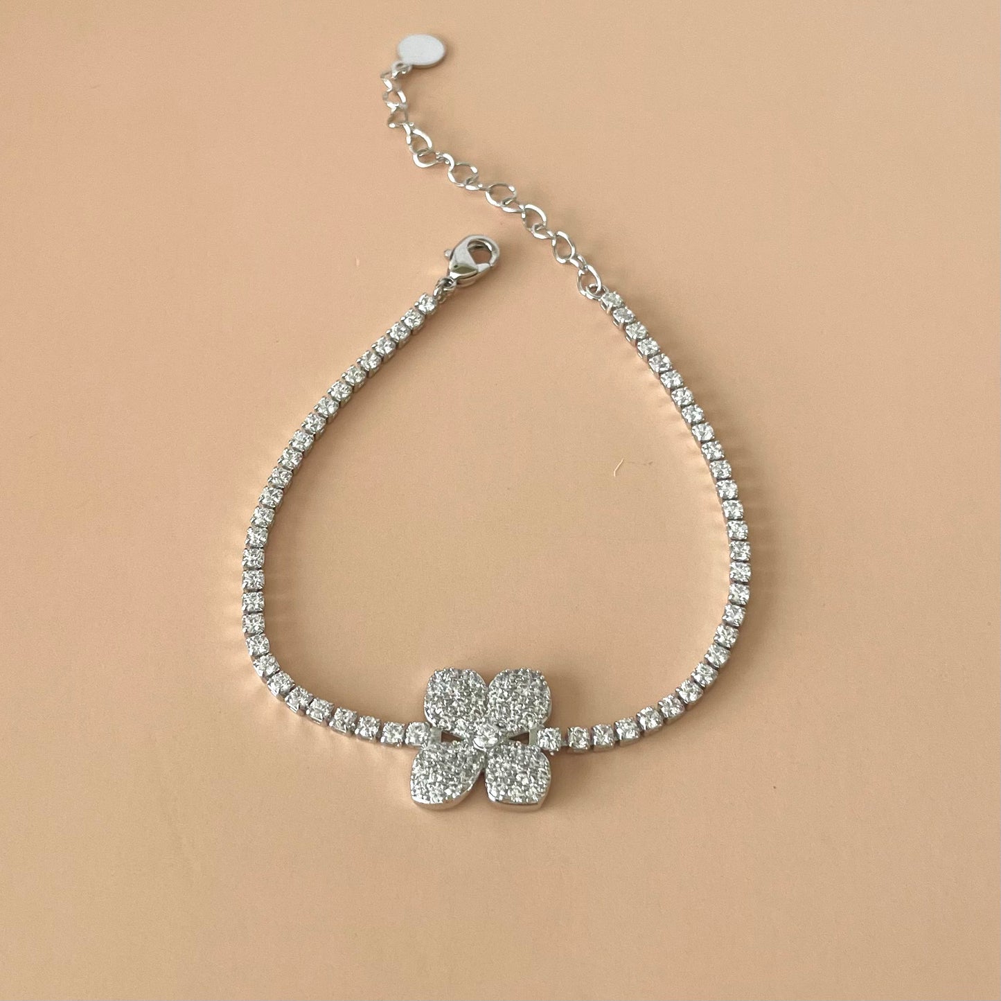 PULSERA TENNIS CON FLOR CUATRO PETALOS SILVER