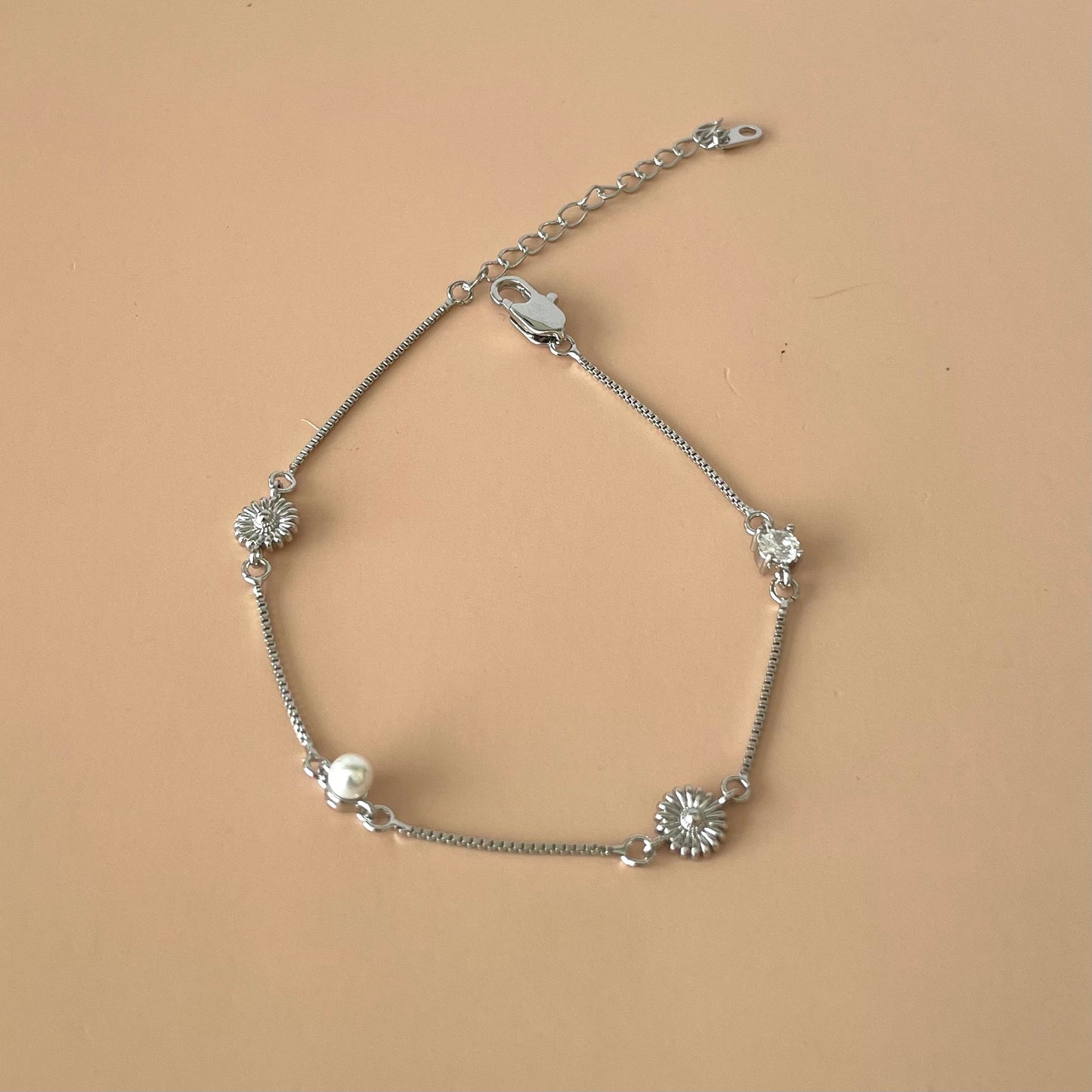 PULSERA FLOR GIRASOL Y PERLA SILVER