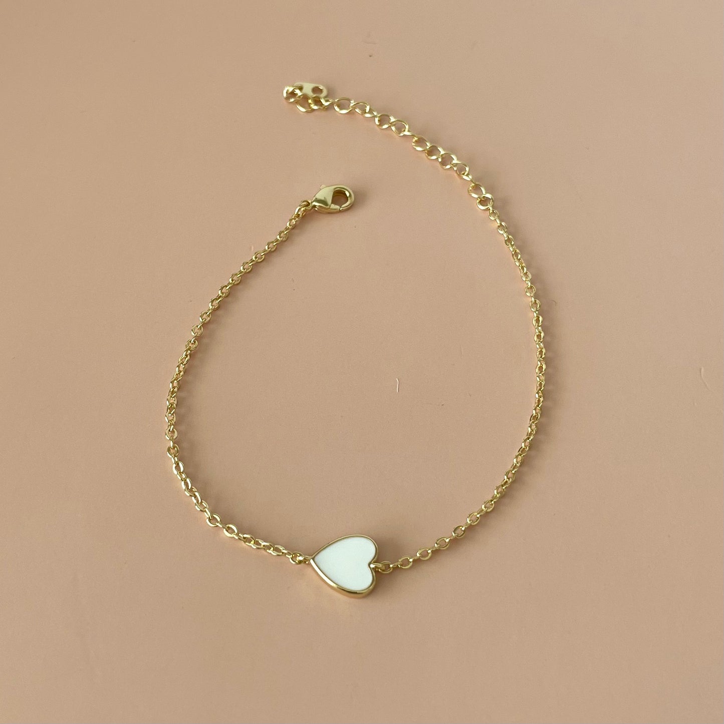 PULSERA GOLD CORAZON BLANCO