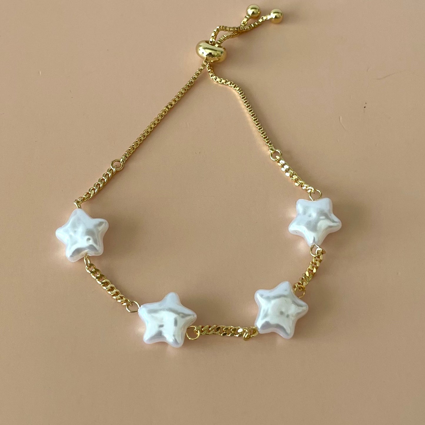 PULSERAS CUATRO ESTRELLAS PERLA