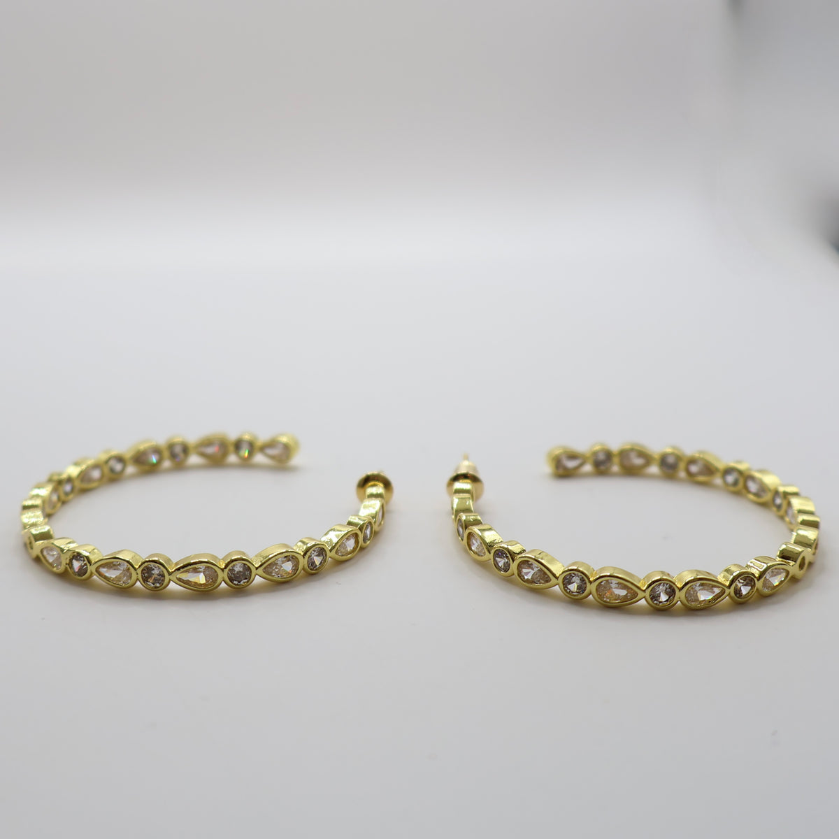 ARRACADA ZIRCONIA GOTA GOLD