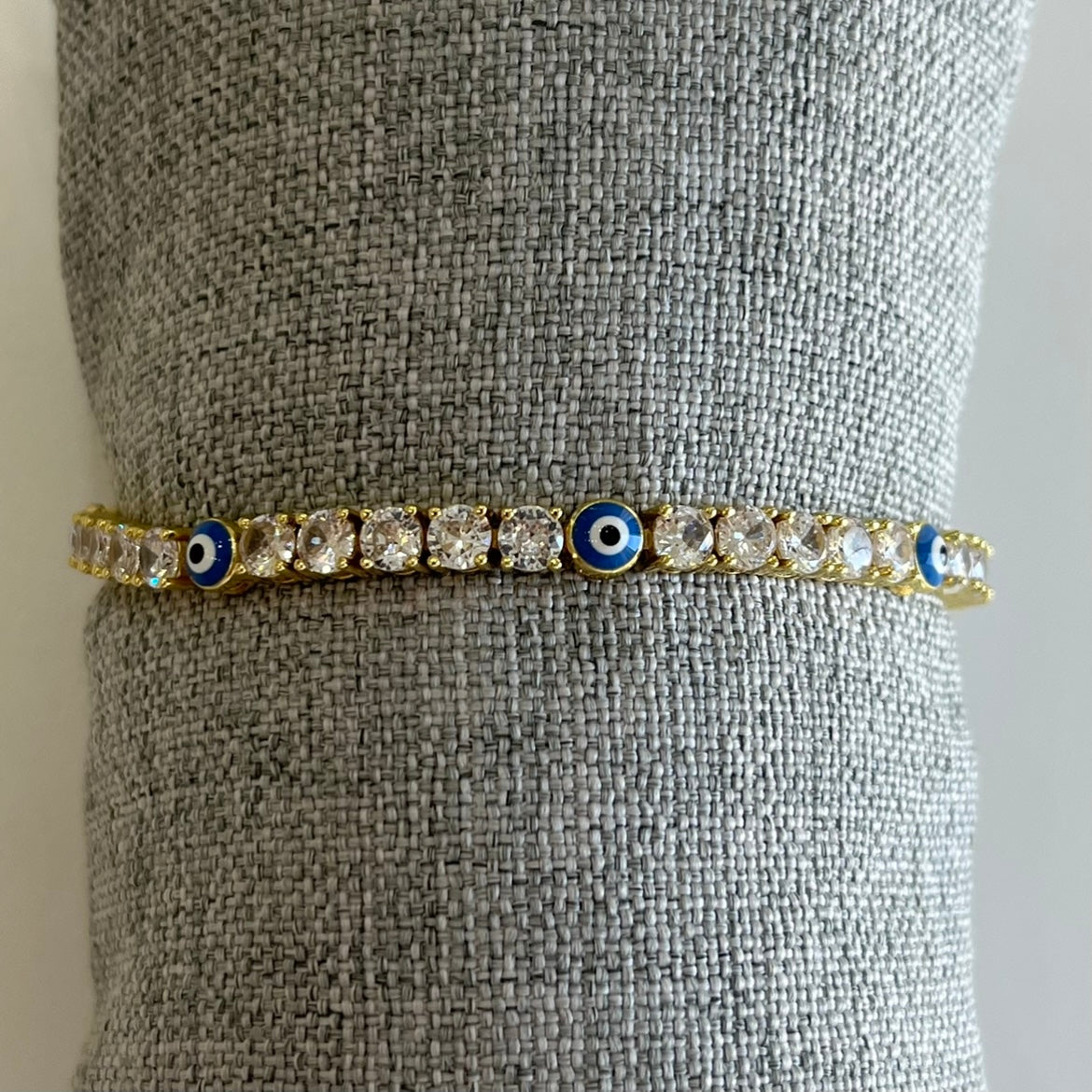PULSERA TENNIS CON OJO AZUL GOLD
