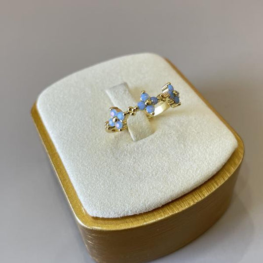 ANILLO TRES FLORES AZUL