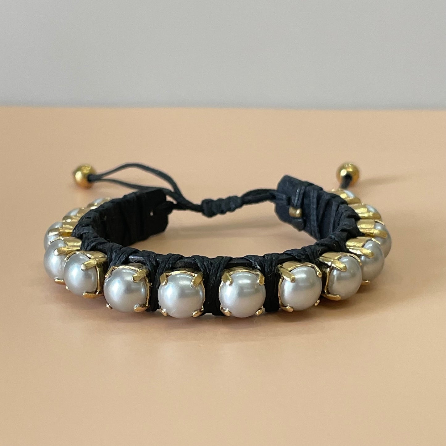 PULSERA FAVORITA PERLAS GRIS -HN