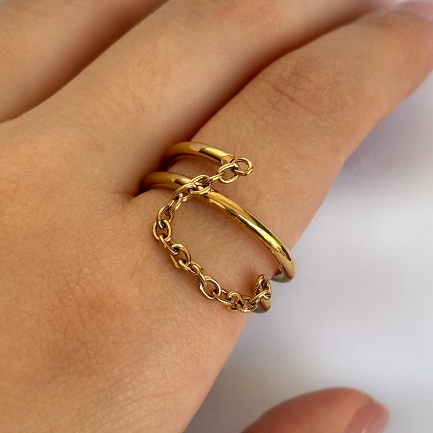 ANILLO DOBLE CON CADENA