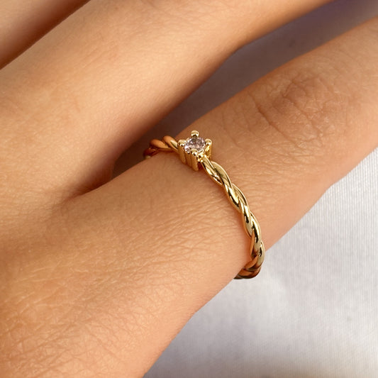 ANILLO TORCIDO CON PUNTO ROSA